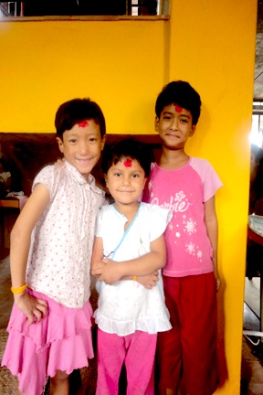 Maya, Rekha and Bina show off their tika