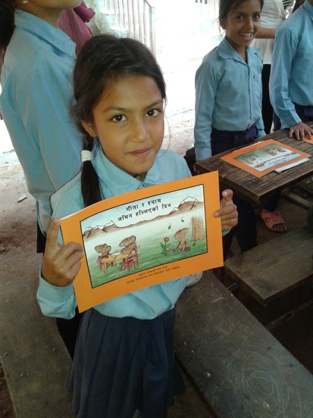 A schoolgirl with her copy of Gita and Shyam