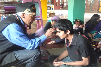 Shrawan Uncle gives tika blessing to Mangal