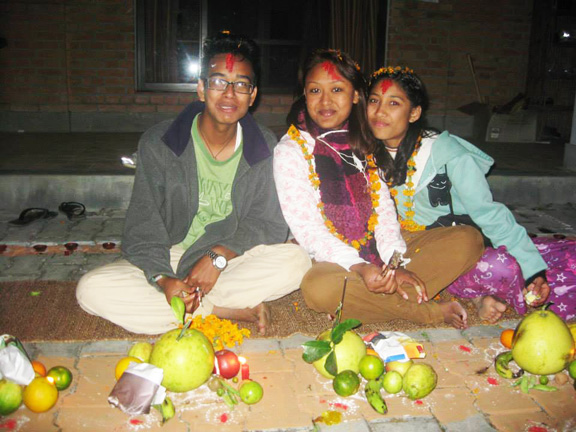 Sajan, Kalpana and Akriti at Mha Puja festivities.